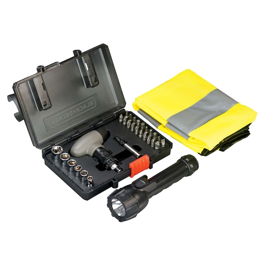 A BLACK+DECKER emergency kit including a black plastic case with assorted screwdriver bits and sockets, a compact screwdriver handle, a flashlight, and a folded high-visibility yellow safety vest with a reflective gray stripe.