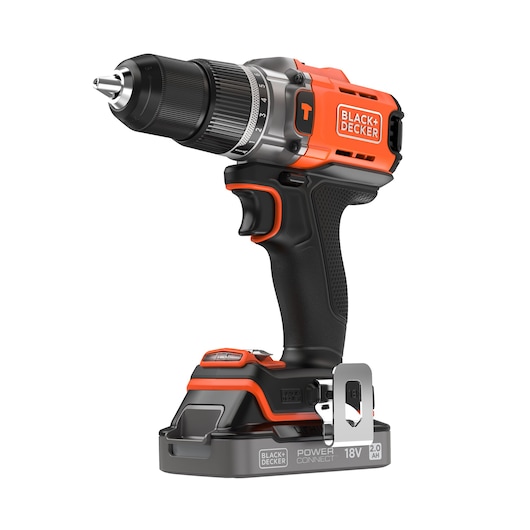 Photo of BLACK+DECKER BCD383D1 cordless drill 18V, black and orange, side angle on white background.