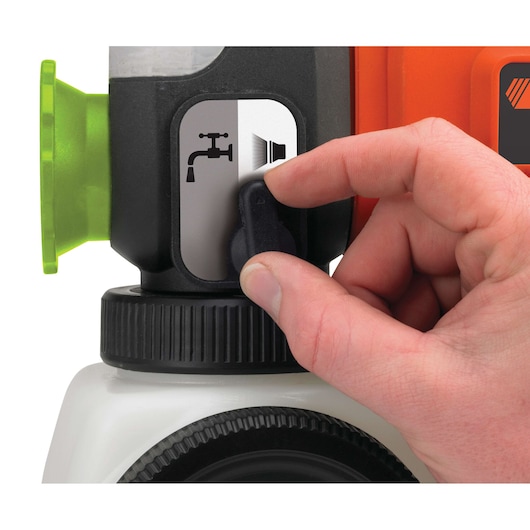 Close-up of hand adjusting control knob on BLACKDECKER BDPS400 sprayer, photography, straight-on angle.