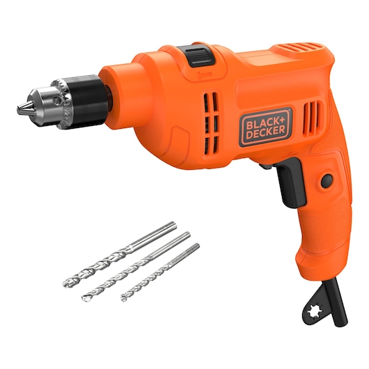 Orange BLACK+DECKER electric drill with three metal drill bits laid beside it on a white background.