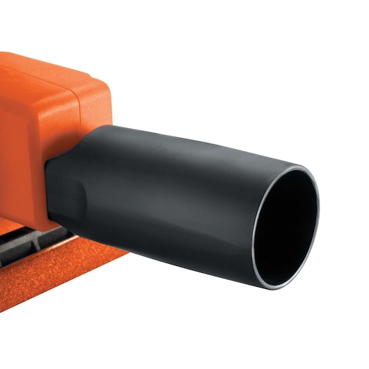 BLACKDECKER KA300 dust extraction port detail, close-up, orange and black finish, photography