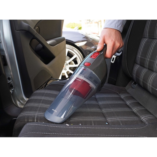 BLACKDECKER NV1200AV handheld vacuum cleaning car seat upholstery.