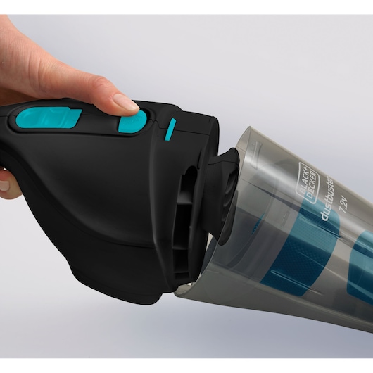 Photo of BLACK+DECKER NV7210N handheld vacuum cleaner close-up, showing dust container release button.