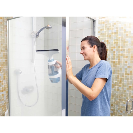 BLACKDECKER WW100 window vacuum cleaning shower glass in bathroom, front angle